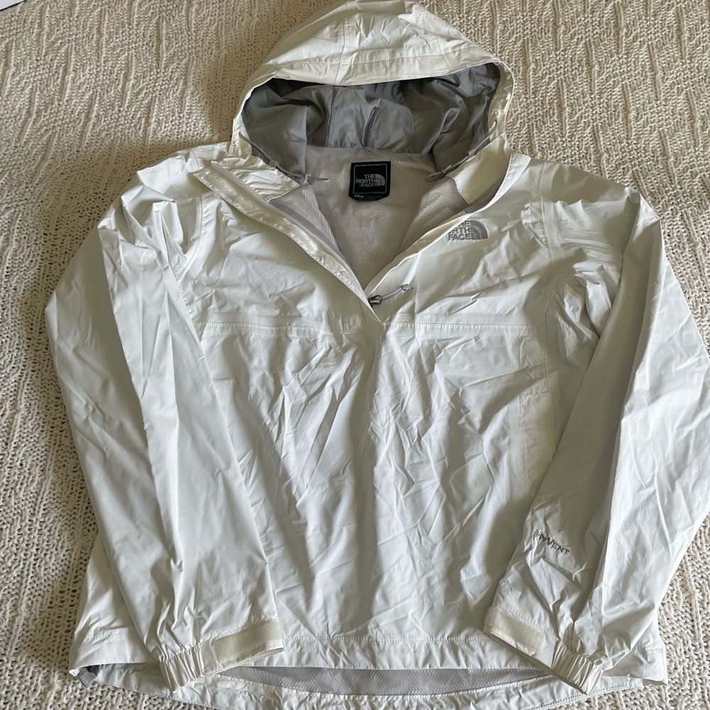 The north face white wind breaker jacket